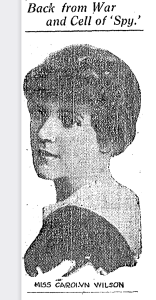 newspapeer clipping with a picture of Wilson looking over her shoulder and the caption "Back From War and Cell of Spy"