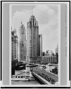 1931 photograph of the Tribune Tower from across the Chicago River